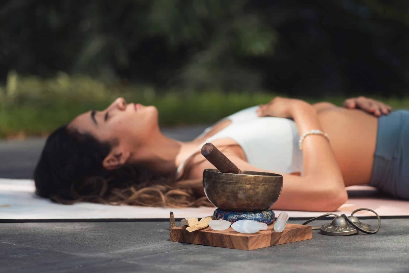 Woman practicing mindfulness meditation outdoors – mindfulness practices